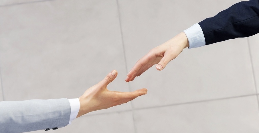 Close up of business handshake between two colleagues-981504-edited.jpeg